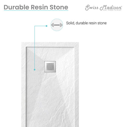60" x 32" rectangular shower base in white resin stone with reversible center drain and textured surface.