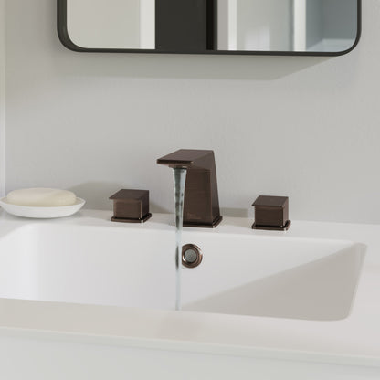 Widespread 2-handle bathroom faucet in oil rubbed bronze with angular spout and lever handles.