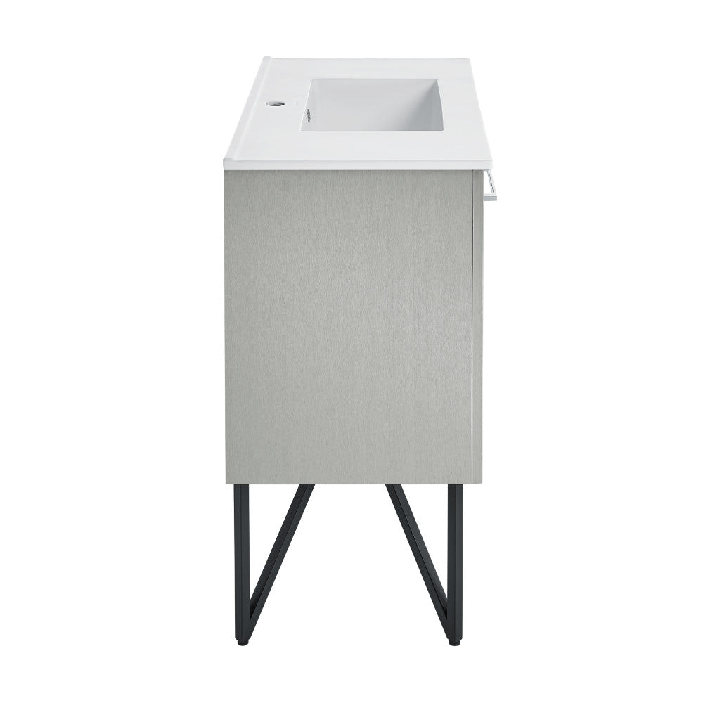 36-inch freestanding gray bathroom vanity with white sink top and metal leg supports.