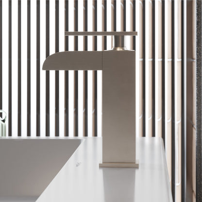 Single-handle bathroom faucet in brushed nickel with waterfall spout, Concorde collection.