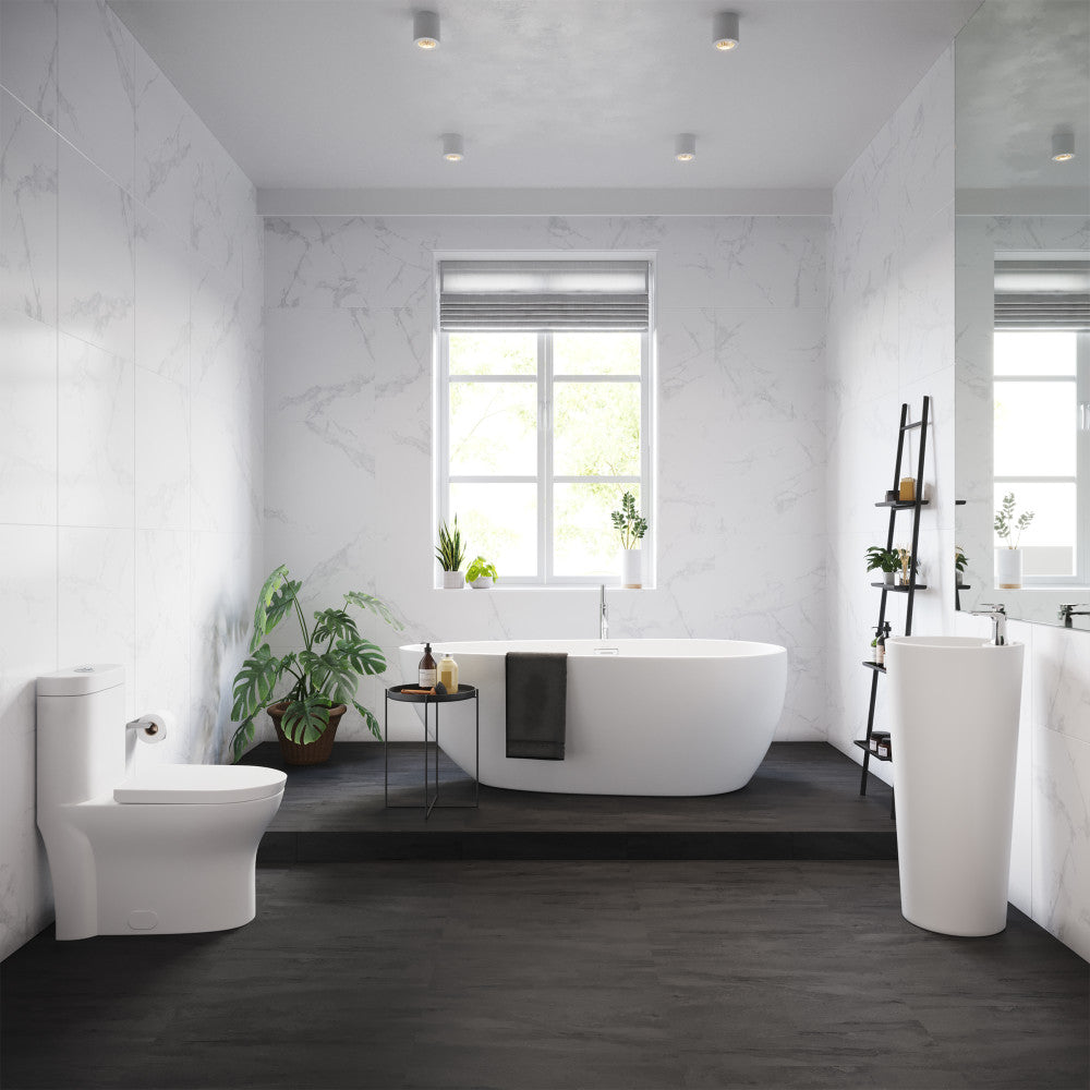 Elongated one-piece toilet with dual-flush, modern design, white ceramic, in a bright bathroom setting.