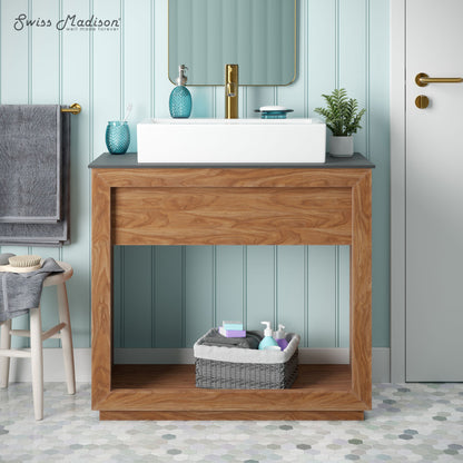 36-inch freestanding bathroom vanity in natural teak with single sink and open lower shelf.