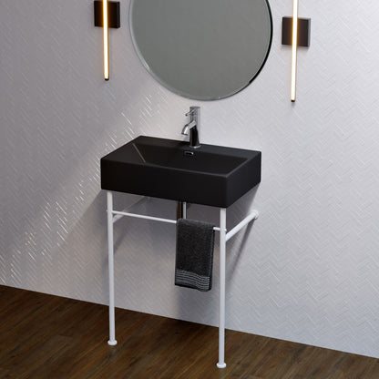 Matte black ceramic console sink with matte white legs and single-handle faucet.