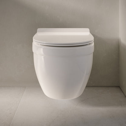 Wall-hung elongated toilet bowl with smooth, minimalist design in white ceramic.