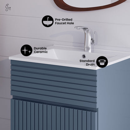 24-inch freestanding bathroom vanity in blue heather with single sink and ribbed cabinet doors.