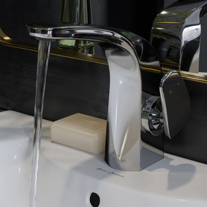 Single-handle bathroom faucet in chrome with curved spout and water flow on white sink.