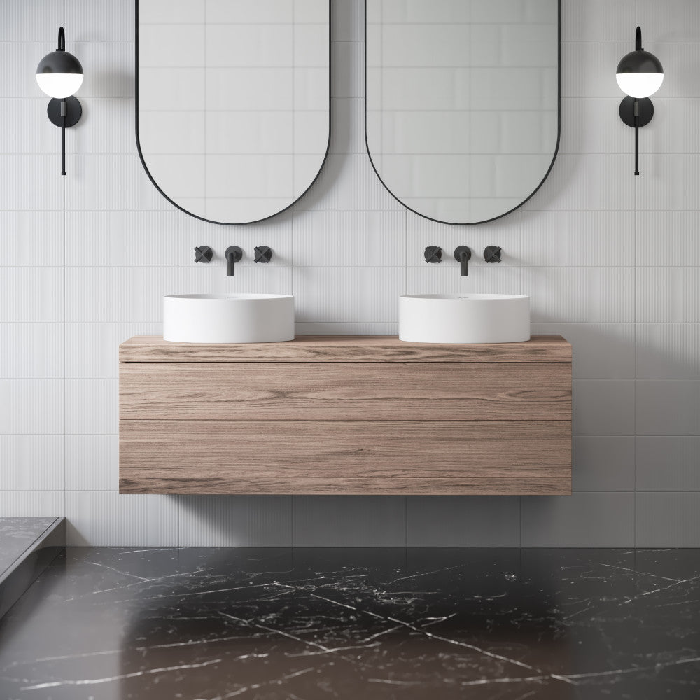 16.5" round vessel bathroom sink in matte white, countertop installation.
