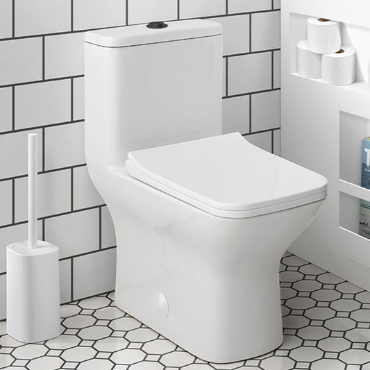 Elongated one-piece toilet with dual flush and black hardware, modern design.