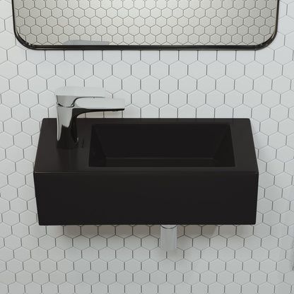 Rectangular wall-hung ceramic sink in matte black with left side faucet mount.