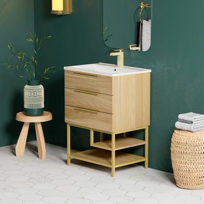 24-inch freestanding bathroom vanity in golden oak with soft-close doors and white sink top.