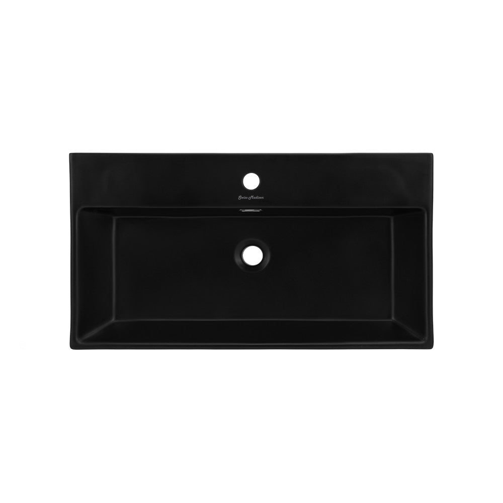 Matte black rectangular ceramic console sink with single faucet hole and center drain hole.