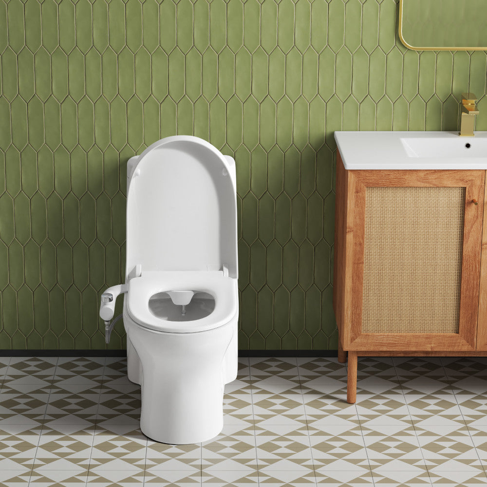 Elongated white toilet with Aqua non-electric bidet attachment and open lid in modern bathroom setting.