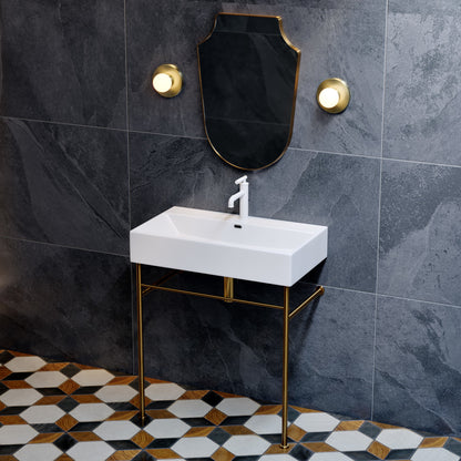 30-inch white ceramic console sink with brushed gold legs and single-hole faucet mount.