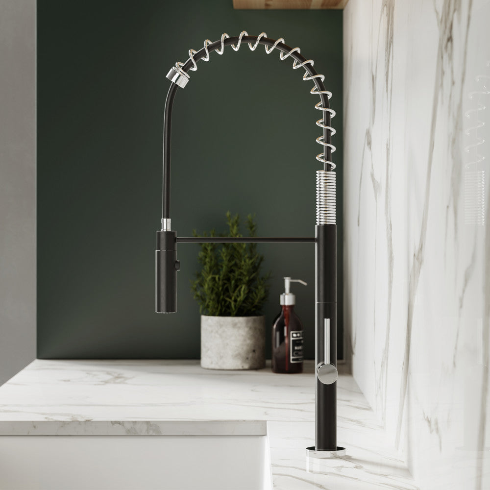 Single handle pull-down kitchen faucet in brushed nickel and black with flexible spring spout.