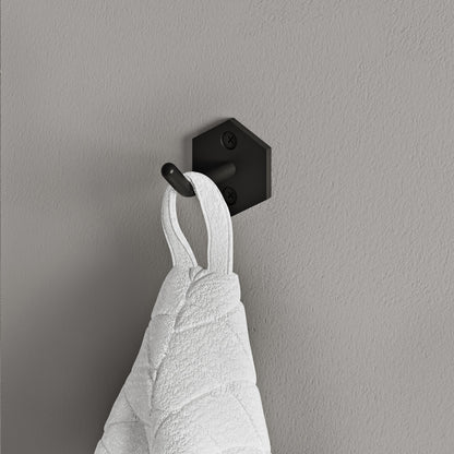 Brusque robe hook in matte black, hexagonal base, curved dual hooks, wall-mounted bathroom accessory.
