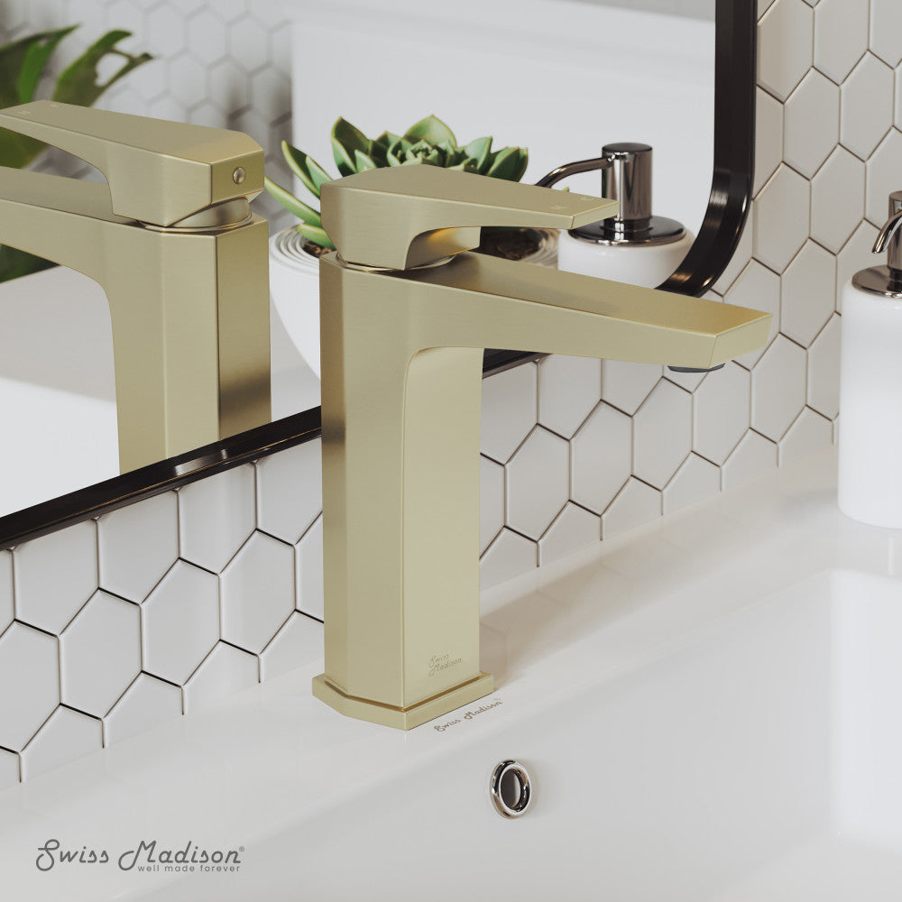 Single-handle bathroom faucet in brushed gold with angular design and square base.