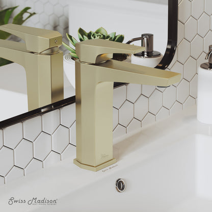 Single-handle bathroom faucet in brushed gold with angular design and square base.