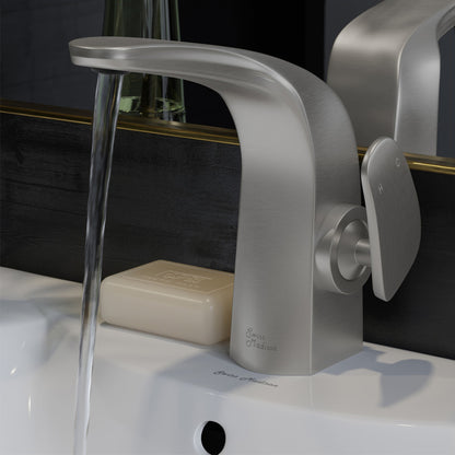 Single-handle bathroom faucet in brushed nickel, sleek curved spout, lever handle on right side.