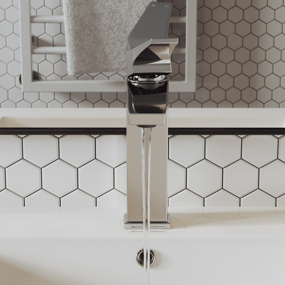 Single-handle chrome bathroom faucet with sleek modern design and square base.