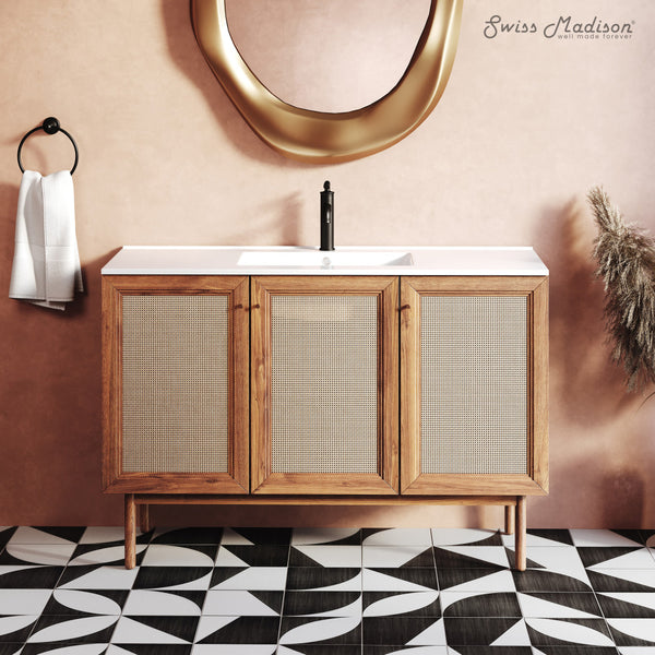 48-inch freestanding golden oak bathroom vanity with sink top and woven front cabinet doors.