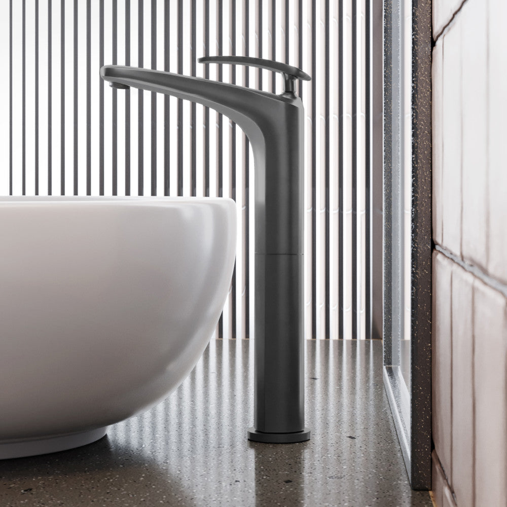 Single-handle high arc bathroom faucet in gunmetal gray with sleek modern design.