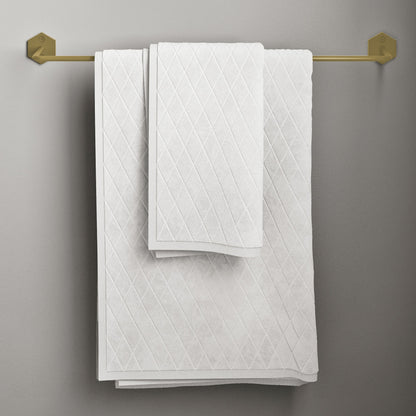 21-inch towel bar in brushed gold with geometric end brackets and white textured towels.