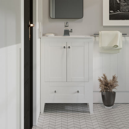 24-inch freestanding white bathroom vanity with single sink, raised panel doors, and bottom drawer.